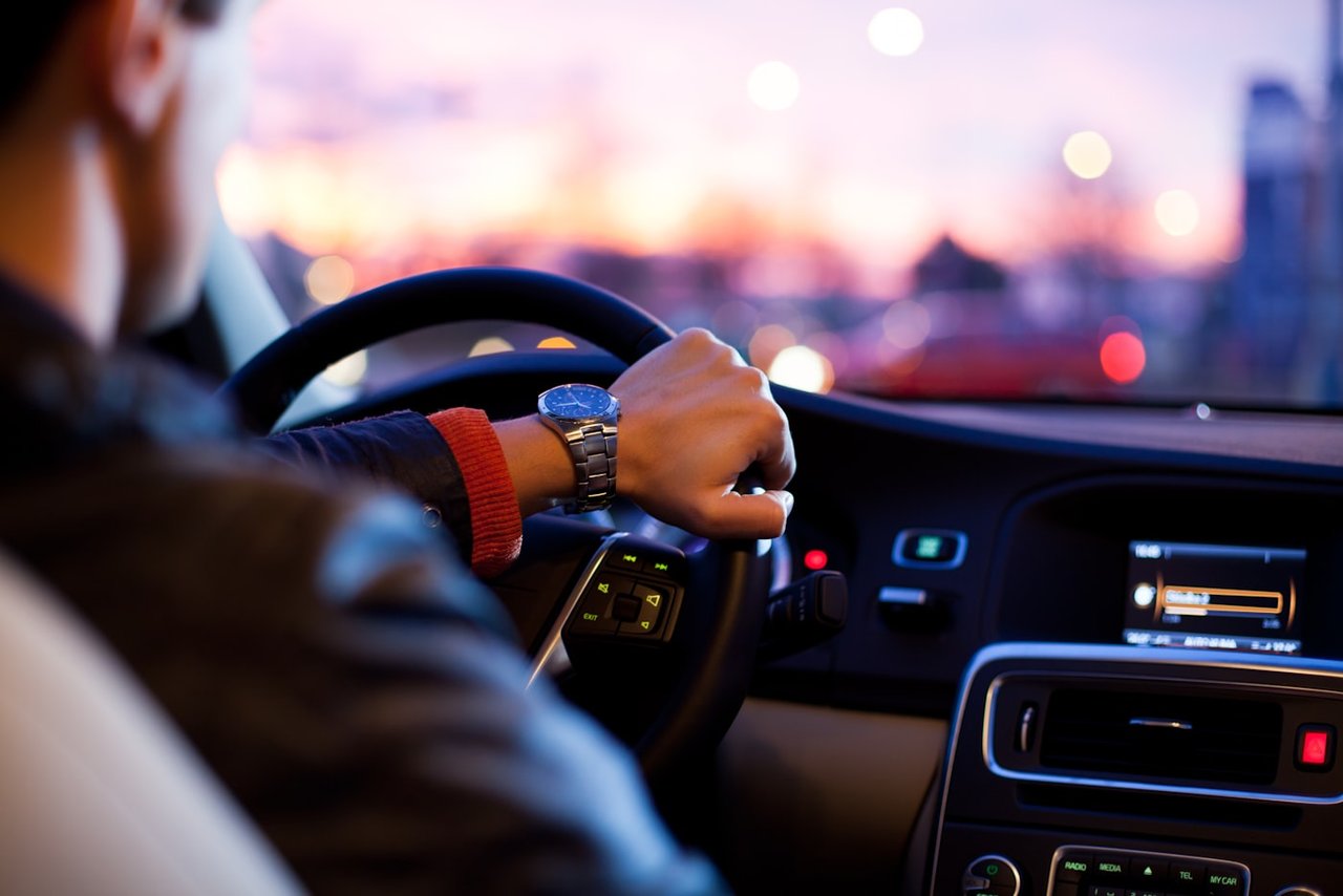 Professional driving lesson with a dual-control instructor vehicle